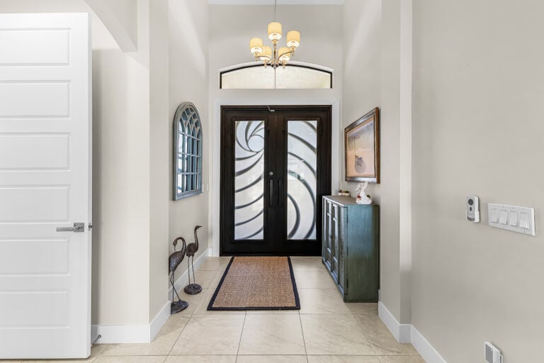 Key Holder Service 1 The front entrance of a Southwest Florida home where Suncoast Property Care holds the key